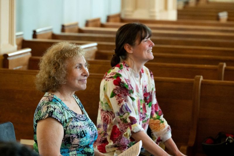 Choir members in a workshop.